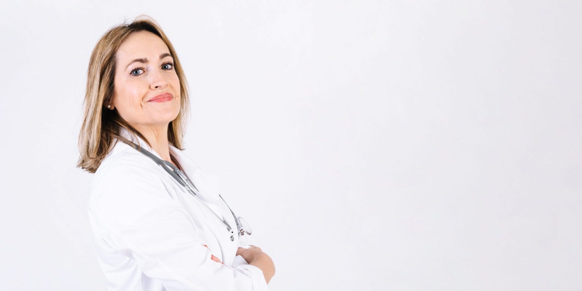 OptimizeRevenue Photo of female doctor illustrates blog "How To Optimize the Revenue of Your Medical Practice?"