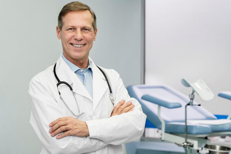 PracticeIQ Smiling doctor illustrates blog "4 Strategies to Increase Patient Retention"