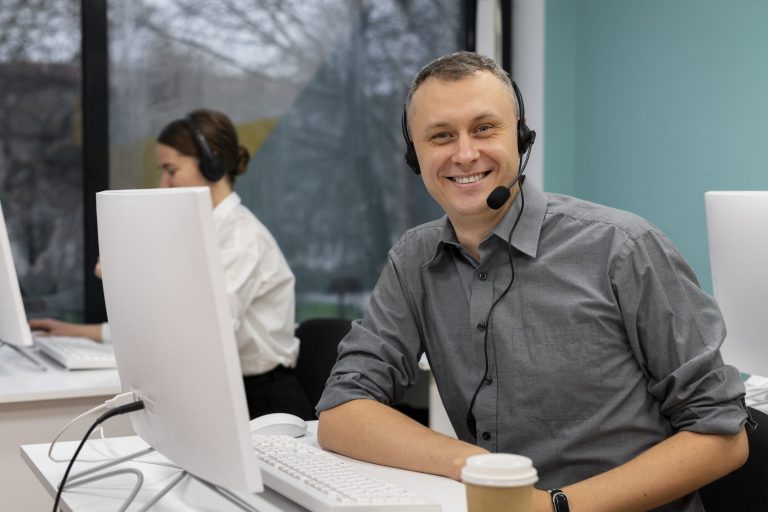 call-center-man-fp Male call center agent wearing headset illustrates blog "Healthcare Call Center Best Practices"