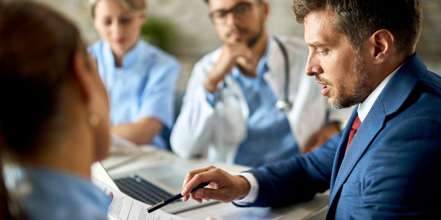 7068 Medical staff reviewing billing claims to reduce medical claim rejections