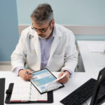 medical staff reviewing annual billing audit report