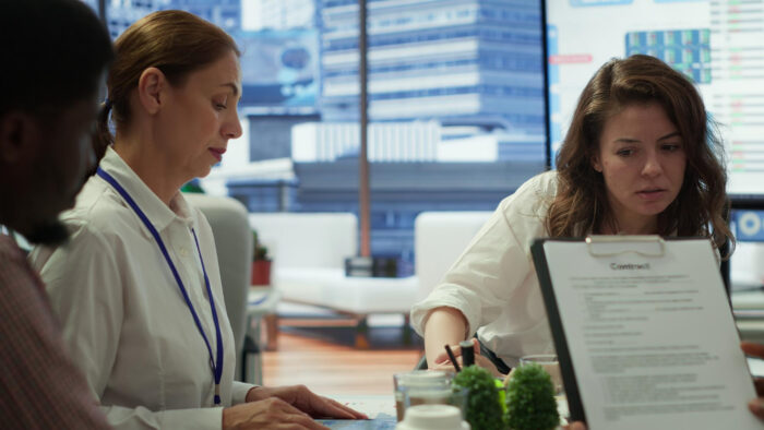 Healthcare administrative team managing billing problems in a growing practice