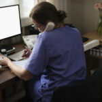 Healthcare staff reviewing admin processes in a medical office
