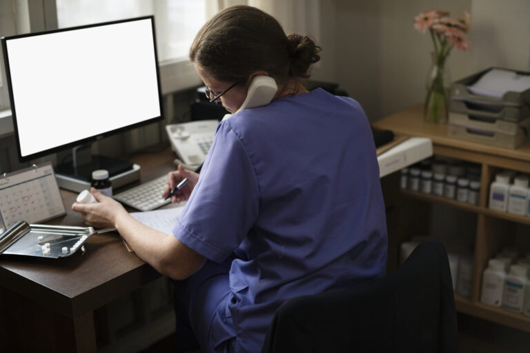 image-healthcare-staff-reviewing-admin-processes-in-a-medical-office Healthcare staff reviewing admin processes in a medical office