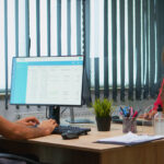 Medical office team addressing revenue leakage between front office and billing departments