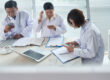 Healthcare billing team handling workers compensation billing and documentation