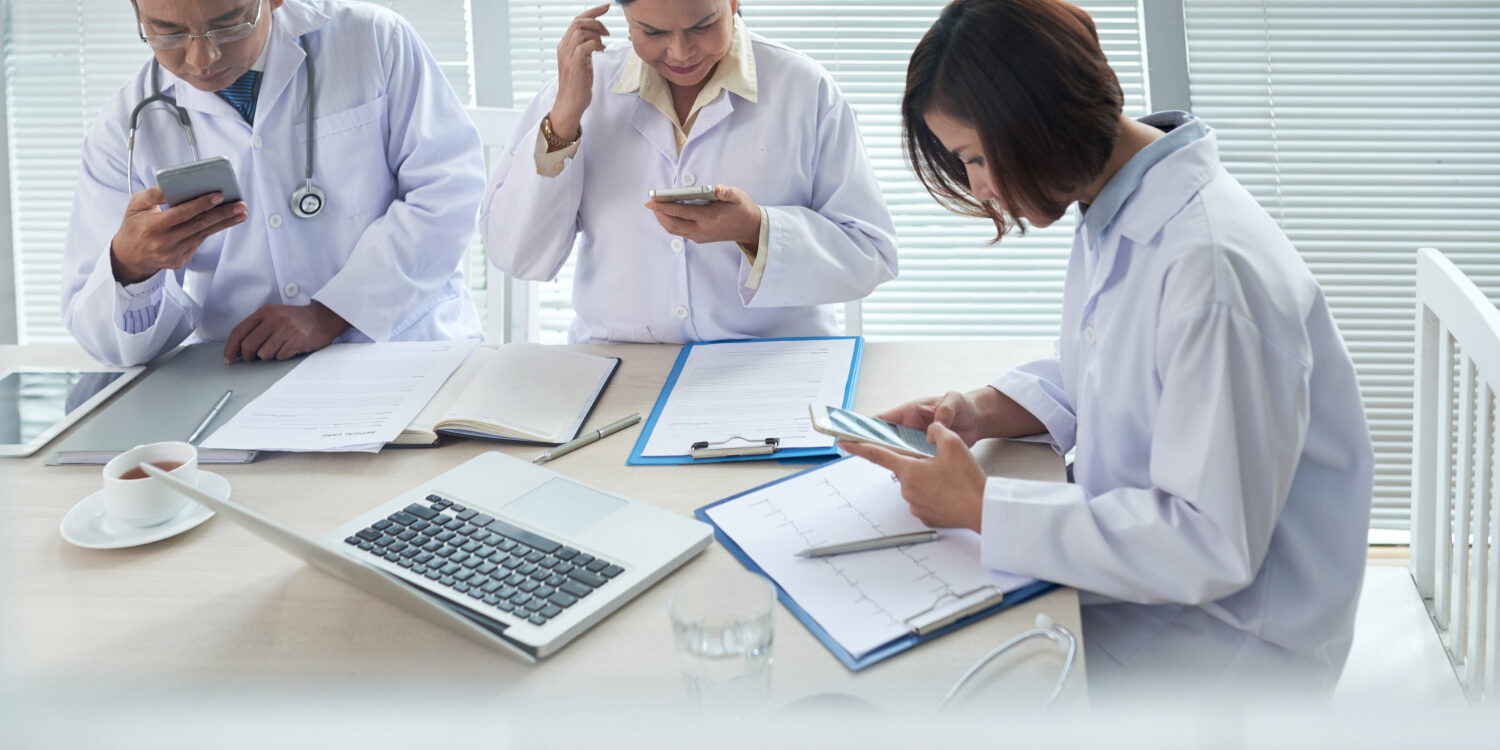 Healthcare billing team handling workers compensation billing and documentation
