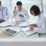Healthcare billing team handling workers compensation billing and documentation