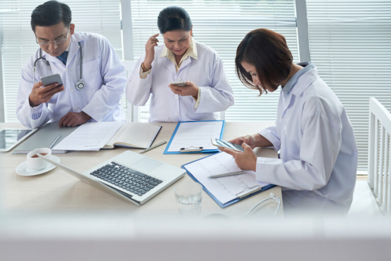 Healthcare billing team handling workers compensation billing and documentation
